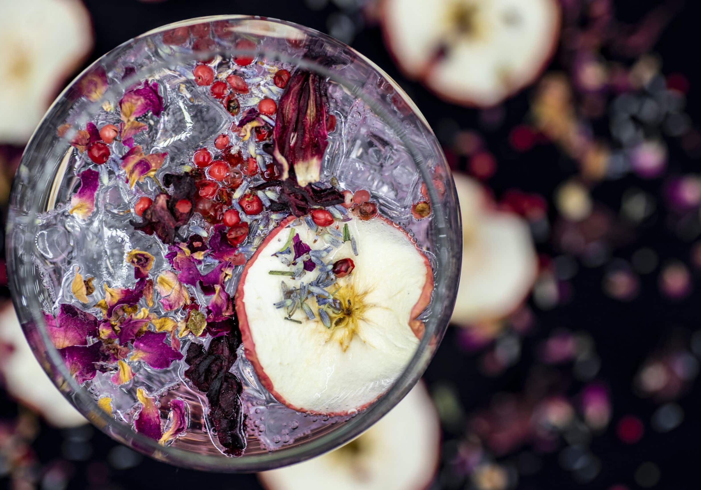 Gin Drink. Contains Apple, hibiscus, rose petals, pink peppercorns and lavender.